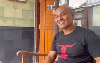 Made Yustika host beekeeper